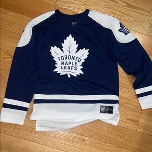 NHL Navy and White Hockey Jersey              size medium & smalll